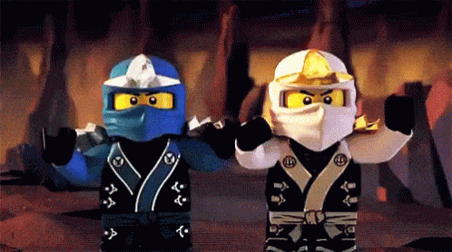 Ninjago minifigures giving each other a high five